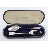 Pair of George IV silver christening items in a box, comprising child's spoon and fork,