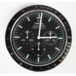 Advertising Wall Clock. Black & chrome 'Omega' advertising wall clock, black dial reads 'Omega