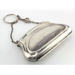 A Lady's silver purse, hallmarked Birmingham 1919 with brown concertina interior and chain handle,