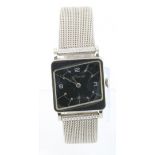 10k gold filled (white) Jaeger Le Coultre manual wind wristwatch with a black rhombus dial. On a