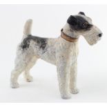 Airdale Terrier (possibly) painted lead cigarette lighter, has age.