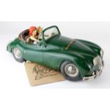 Guillermo Forchino comic art model 'Le Reve', depicting an older gentleman driving his younger
