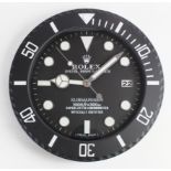 Advertising Wall Clock. Black 'Rolex' advertising wall clock, black dial reads 'Rolex Oyster