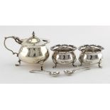 Pair of matching silver open salts and two silver salt spoons hallmarked for W&H, Sheffield 1915 and