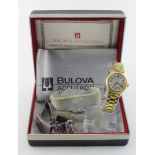 Boxed gold-plated Bulova accutron wristwatch circa 1967 along with a spare stainless steel Bulova