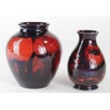 Moorcroft. Two small Moorcroft flambe vases, height 100mm & 90mm approx.