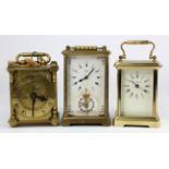 Three brass carriage clocks, makers include 'The London Clock Co.' & 'Schatz'