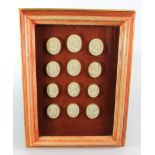 Grand Tour interest. A collection of twelve Grand Tour intaglio plaster plaques, circa 19th Century,