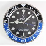 Advertising Wall Clock. Blue, black & chrome 'Rolex' advertising wall clock, black dial reads 'Rolex