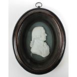 Plaster relief portrait of a Gentleman, circa 19th Century, signed to base of plaque 'John Tassie,