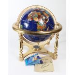 Large gemstone globe in a cradle, diameter 21cm approx., contained in original box