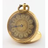 Ladies 18ct cased fob watch, the gilt dial with black arabic numerals. Approx 35mm dia,