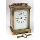 French brass five glass carriage clock, white enamel dial with Roman numerals, makers name to dial