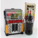 Two novelty items, Juke-box clock and Coca-Cola radio. Clock working but radio needs attention;