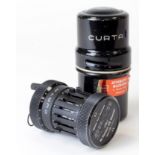 Curta Type I calculator (no. 46503), by Contina AG Mauren, ring catch split, contained in original