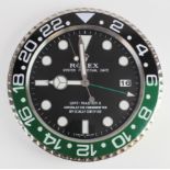 Advertising Wall Clock. Black, green & chrome 'Rolex' advertising wall clock, black dial reads '