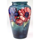 Moorcroft Anemone pattern vase, with Moorcroft stamp and paper label to base, height 20cm approx.