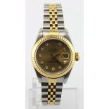 Ladies Rolex oyster perpetual datejust wristwatch, the 26mm gold coloured dial with diamond