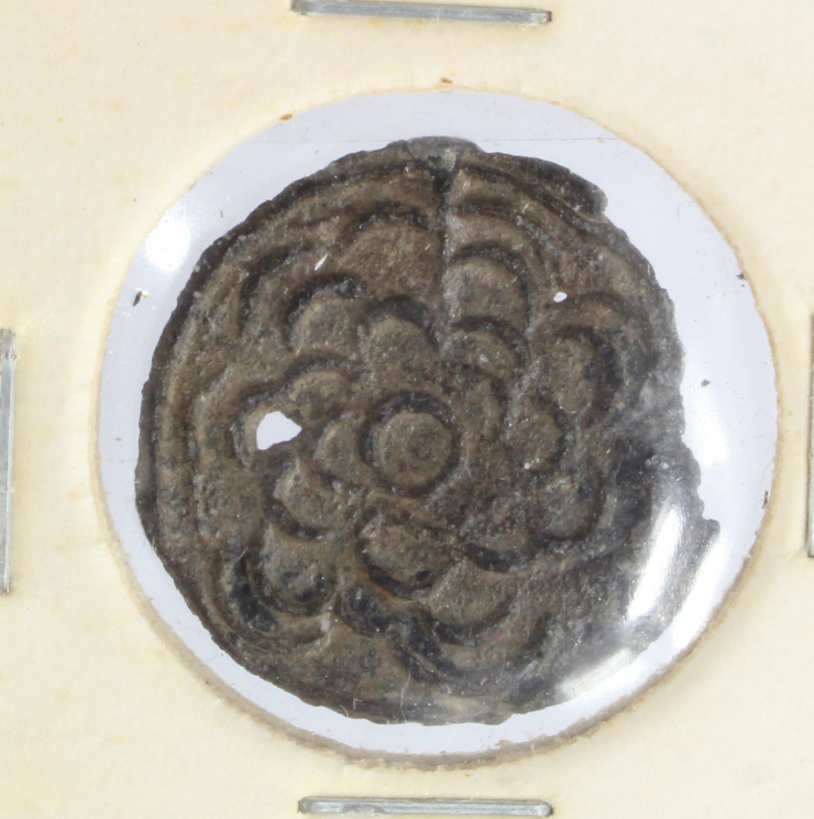 Brunei anon. 18th-19thC tin 'flower' coin d.21.5mm, nVF with some chipping, holed as usual.