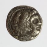 Alexander III the Great 336-323 B.C., silver drachm, reverse:- Zeus seated left on throne with no