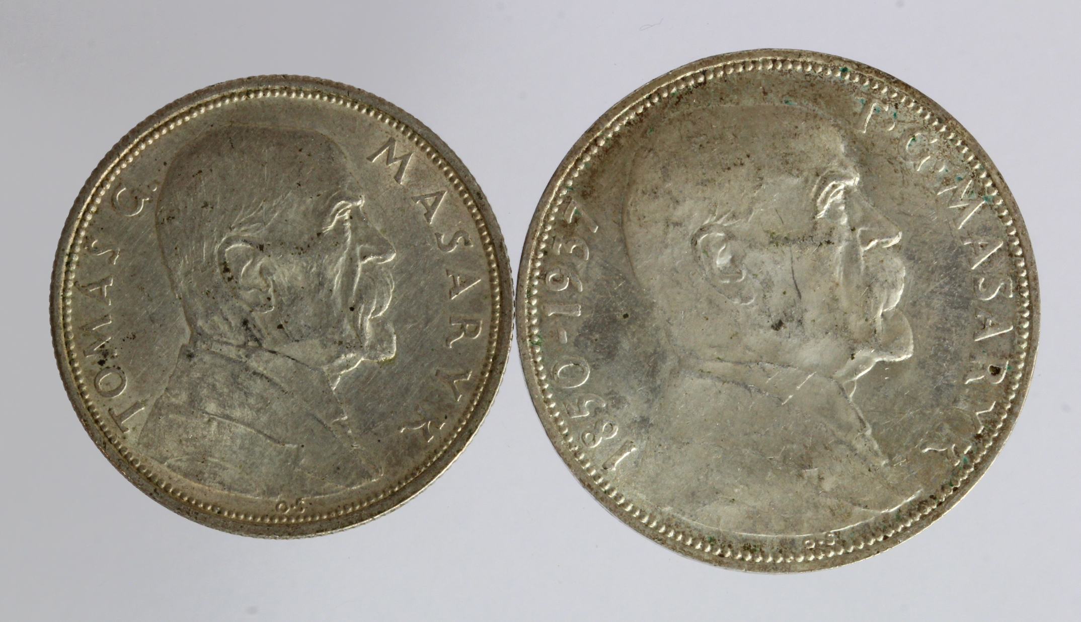 Czechoslovakia (2) silver: Thomas Masaryk 10 Kc 1928 aEF, and similar 20 Kc 1937 speckled tone EF