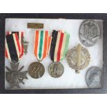 German group as awarded to a soldier including the Memelland Medal (8 items in case)