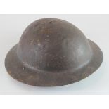 British WW1 Brodie raw edge tin helmet with liner & chin strap, has been restored in past most