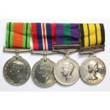 Group of 4 medals mounted for wearing to including WW2 Defence and War, George VI General Service