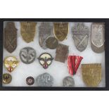 German Nazi Arm Shields and Gau Badges, various in display case (16)