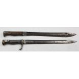 Butchers Bayonets. A Sawback Gew 95/05 Butcher Bayonet heavily worn and pitting to blade, no