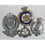 Police badges comprising Antigua, H.M. Prisons Bermuda, Tanzania Police & City of Edmonton Police