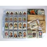 Various Cigarette Card sets and part sets, loose and stuck in, plus small amount of Brooke Bond. (