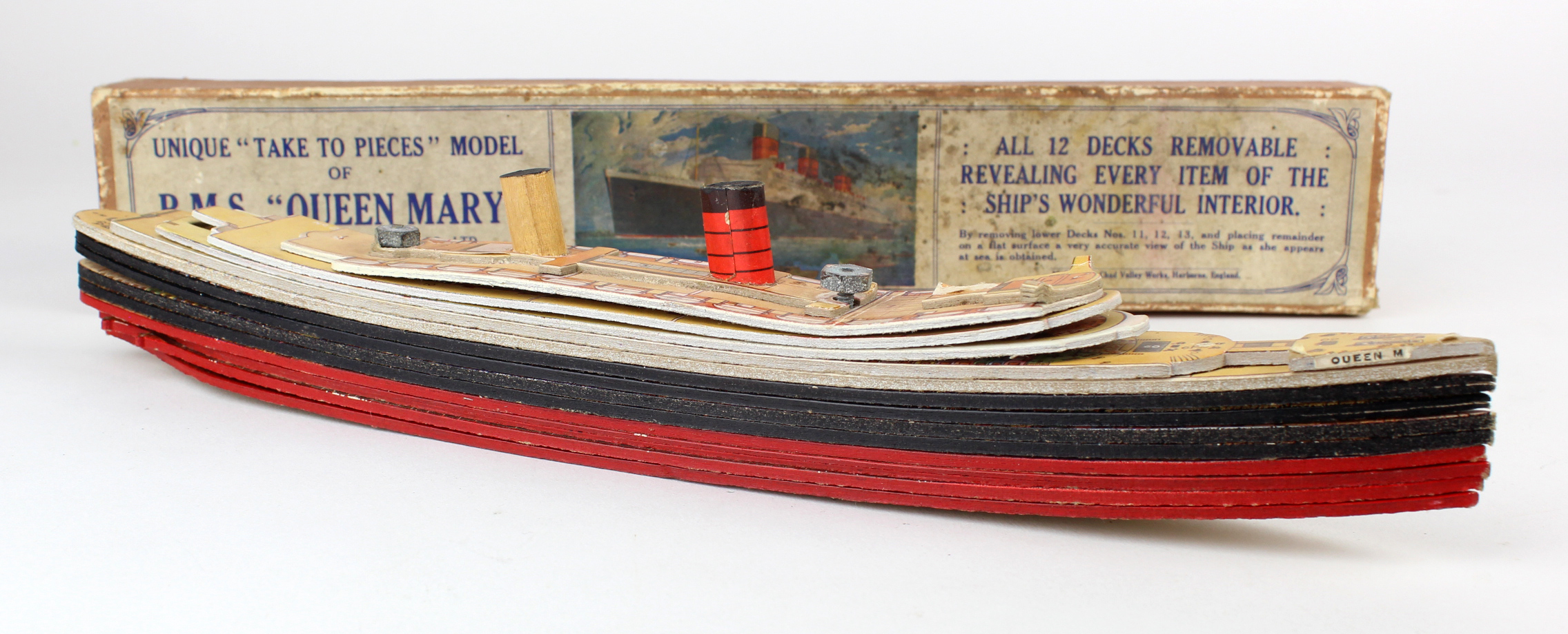 Chad Valley 'Take to Pieces' model of the R.M.S. Queen Mary ship, contained in original box,