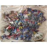 Lead figures. A collection of approximately fifty lead Cowboys & Indians, circa early to mid 20th