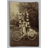 Suffragette RP postcard 'Votes For Women' lady in costume with bike. p/u Ruskington 1911