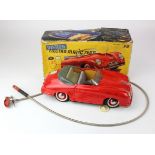 Distler Electro Matic 7500 battery operated tinplate Porsche Cabrolet, red with grey interior,