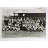 Cardiff City season 1960/61 b&w Press Photograph of full playing squad (11"x8") with manager/trainer