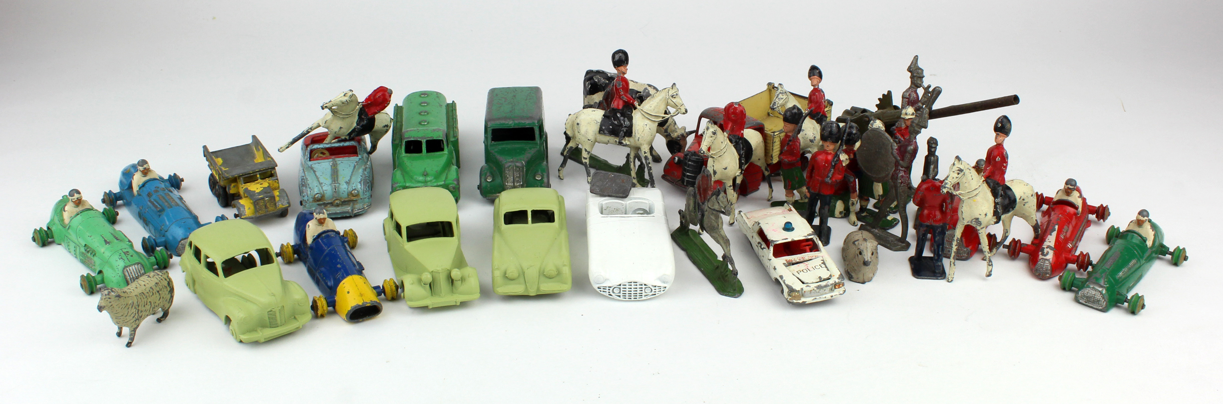 Dinky. A shoe box of dinky diecast vehicles and Britains lead figures including racing cars, Chivers