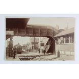 Railway station postcard. Saxmundham Suffolk (interior, with steam train, staff, passengers),