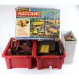 Meccano. A large quantity of old Meccano contained in three crates & a boxed set (incomplete)