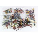 Lead figures. A collection of approximately fifty-five lead cowboy & indian figures, by J. Hill &