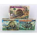 Bandai. Three Bandai plastic dinosaur kits from the Prehistoric Animal series 1/35th scale,