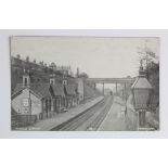 Railway station postcard. Moseley Birmingham (interior, with steam train approaching), postally used