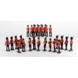 Britains. A collection of twenty-eight Britains lead soldiers, in the Grenadier Guards colours,