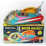 Original Japanese battery operated tinplate non fall moon rocket, by Masudaya, with spaceman,