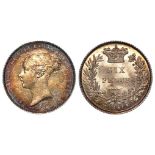 Sixpence 1851 GEF with a golden tone.