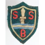 Badge an SBS Special Boat Service Beret badge with green background.