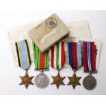 WW2 group - 1939-45 Star, Italy Star, Air Crew Europe Star, Defence & War Medals. Two postcards, one