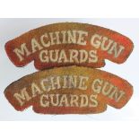 Badges WW1 Machine Gun Guards cloth shoulder titles pair, very service worn.