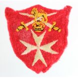 Cloth badge - British Army Officer rank insignia with Maltese Cross below